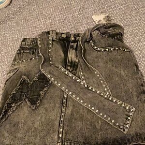 Hannah Banana denim skirt with lightning bolt details! ⚡️